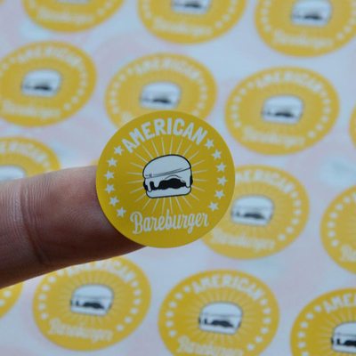 Les labels adhésifs faits sur commande de rond d'impression laser soutiennent l'épaisseur adaptée aux besoins du client